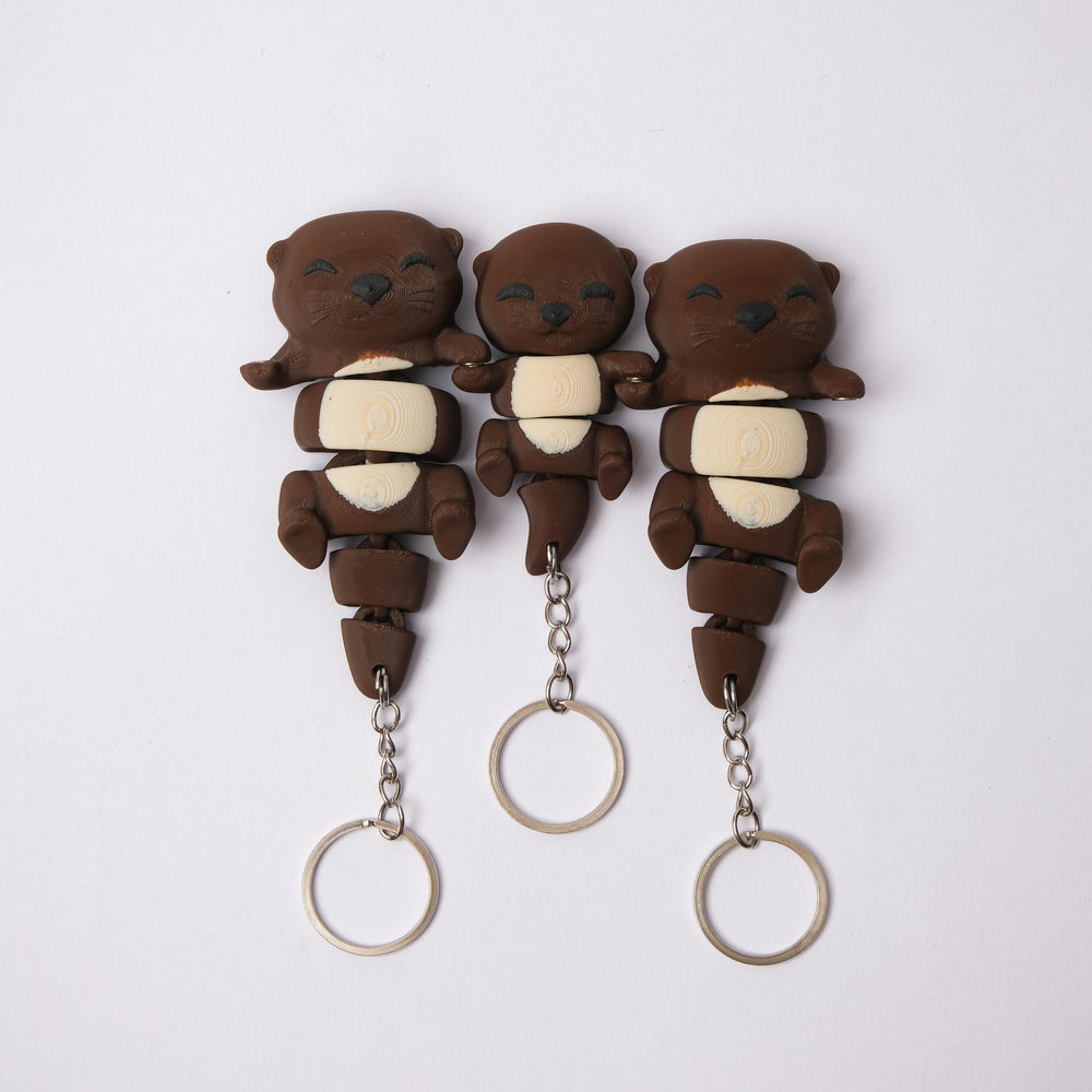Flexi Otter Family - MagniMates Keychains